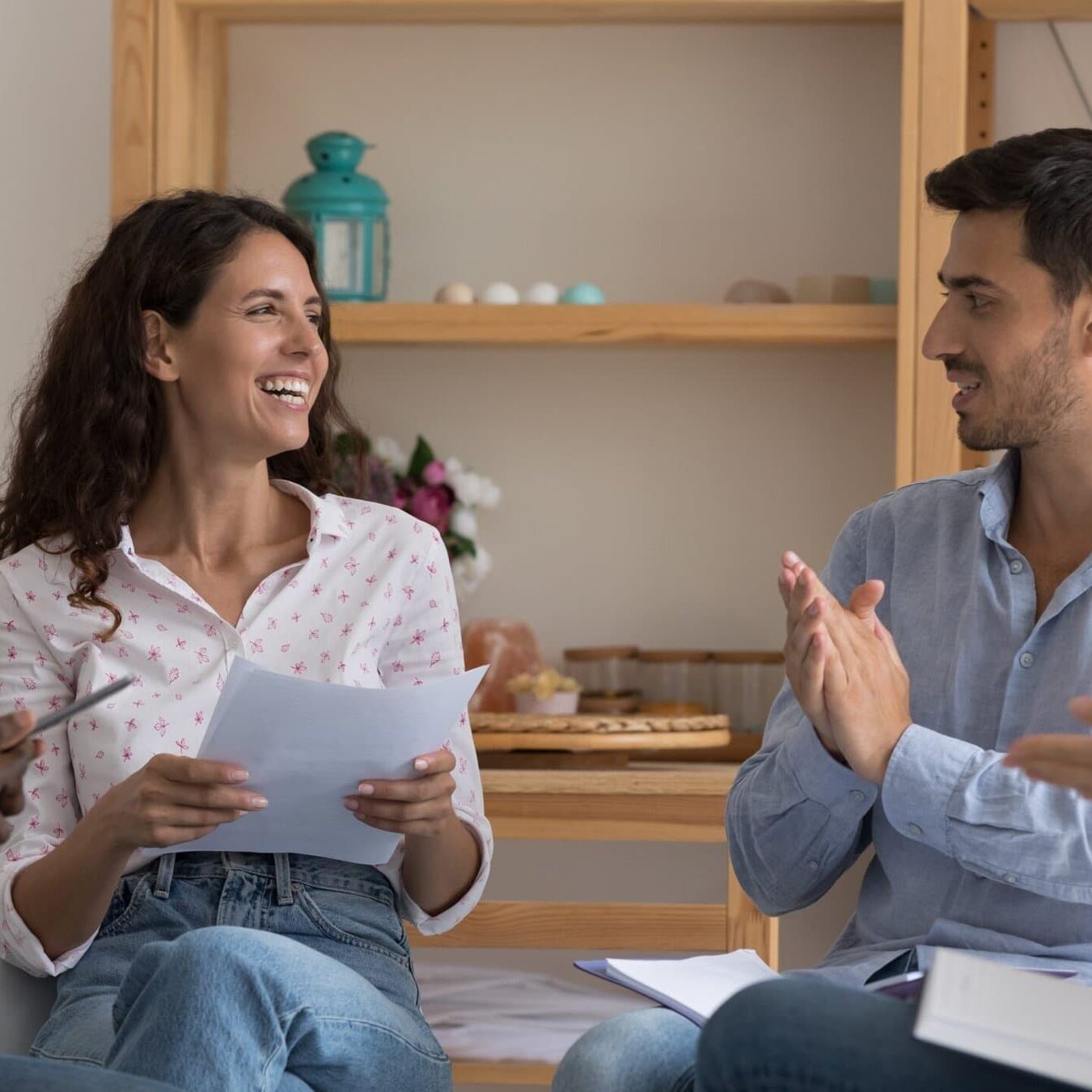 Multiethnic,Business,Team,Applauding,Leader,,Speaker,,Woman,With,Papers.,Group