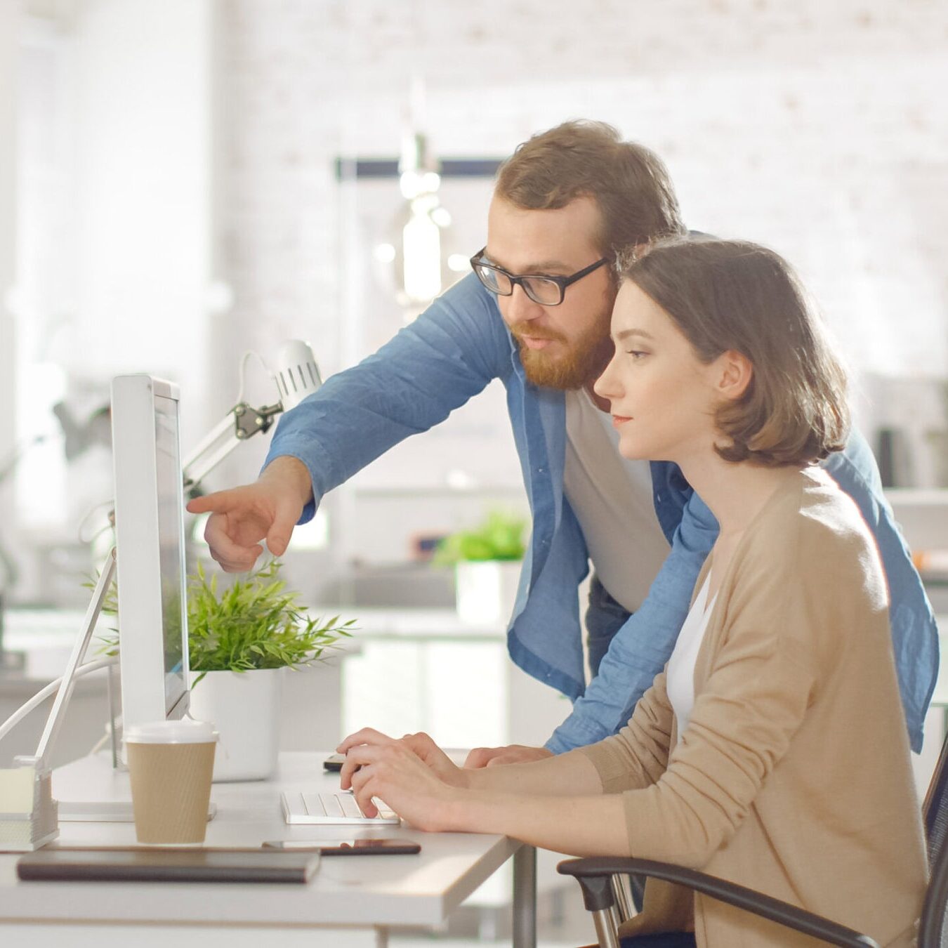 Young,Male,Manager,And,Beautiful,Woman,Discuss,Working,Issues,At