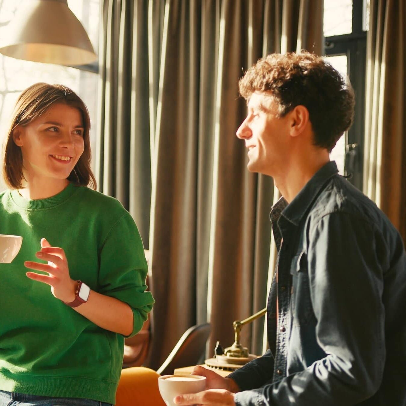 Cheerful,Young,Man,And,Woman,Enjoying,Lively,Conversation,While,Drinking