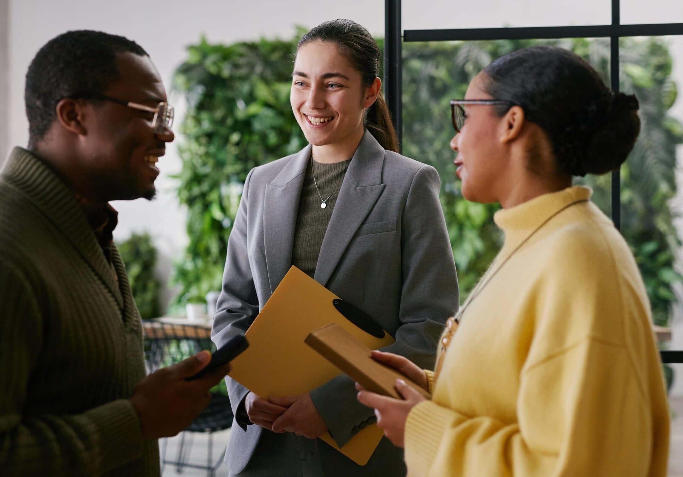 Young,Adult,Black,Man,Talking,With,Young,Adult,Caucasian,Woman